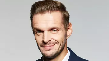 Kabarettist Florian Schröder, lächelnd 